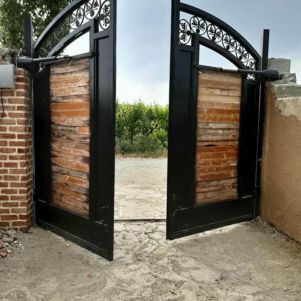 جک درب پارکینگ بازویی 184 راهنمای انتخاب جک درب پارکینگ با تاکید بر ایمنی و خدمات