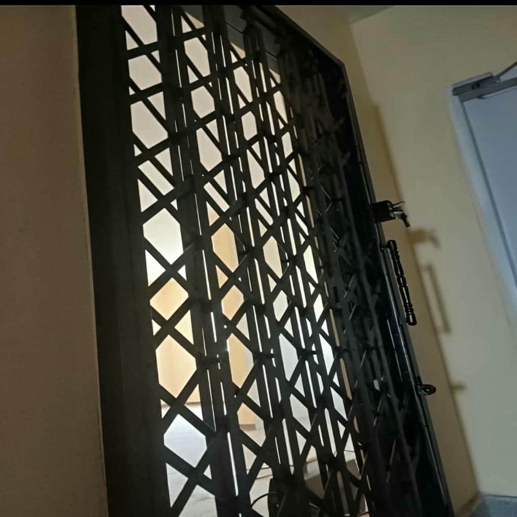 خرید درب آکاردئونی حفاظ متحرک کلاسیک در محمدشهر