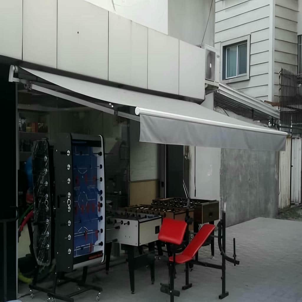 نصب سایبان برقی بازویی پوشش مقاوم در بندر انزلی