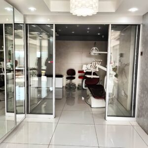 قیمت درب لولایی اتوماتیک شیشه ای