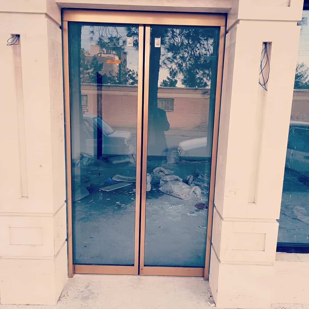ساخت درب اتوماتیک شیشه ای هتلینگ گردان