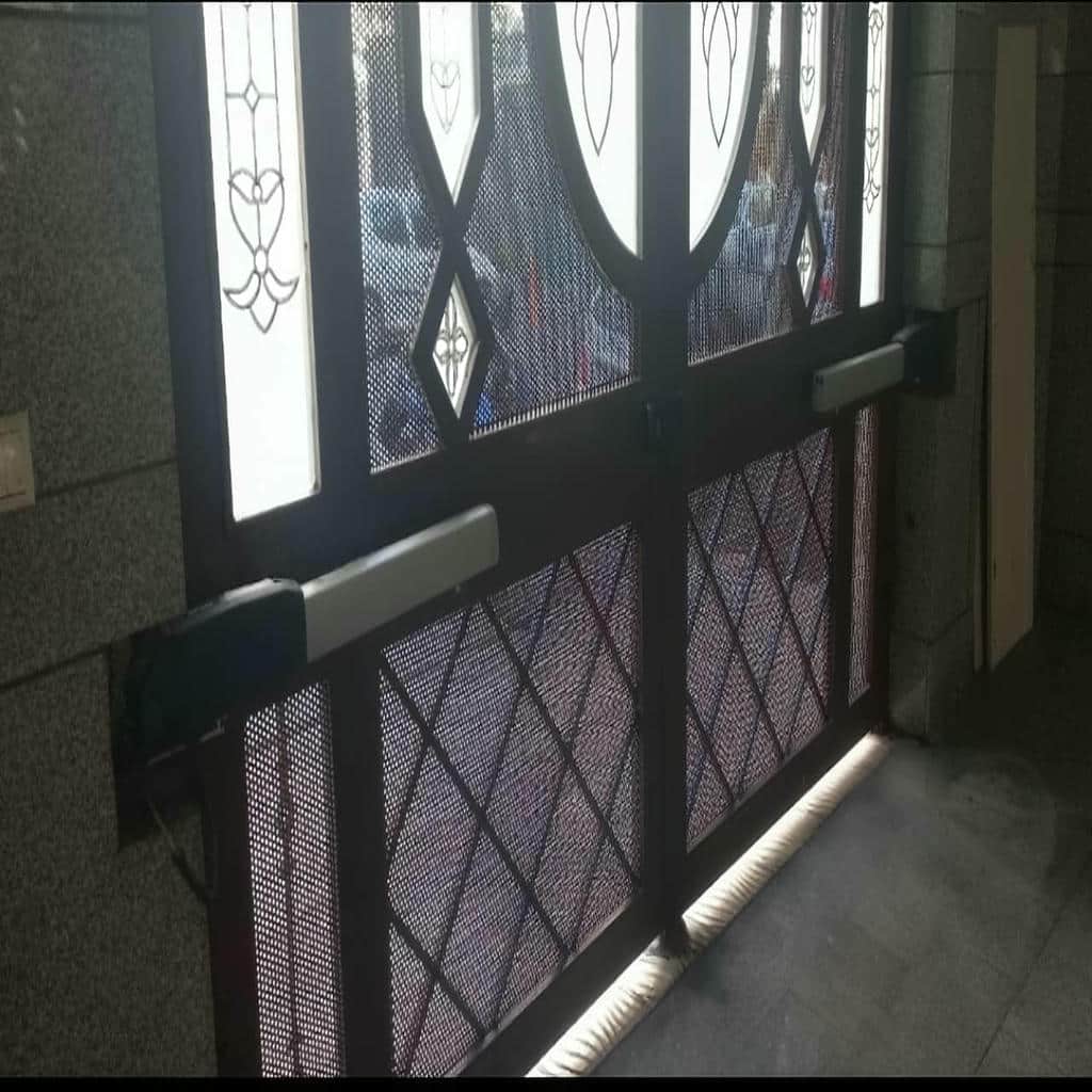 سفارش جک بازویی درب پارکینگ دو لنگه متناسب با دهانه