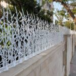 حفاظ دیوار سرنیزه ای روی دیوار پلکانی اراک مرکز فروش حفاظ دیوار سفارشی در اراک و حومه