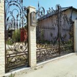 درب حیاط ساده طوسی برای خانه بازسازی شده استان قم مرکز فروش درب حیاط ساده و کاربردی در استان قم