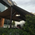 سایبان برقی کرم بالای سردر فرفورژه اهواز مرکز فروش و نصب سایبان برقی در اهواز و حومه